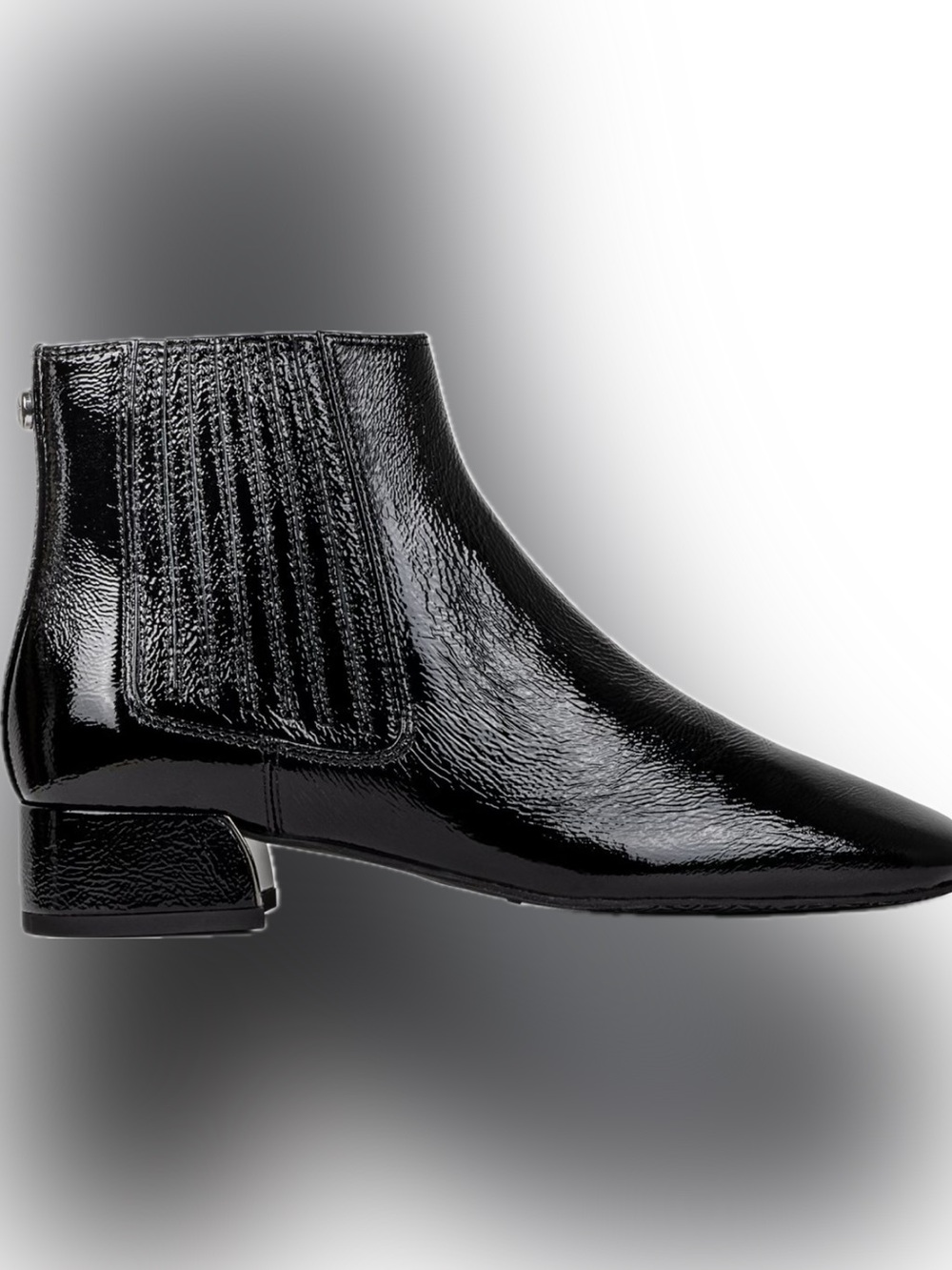 Donald Pliner black “Daisa” Chelsea boots